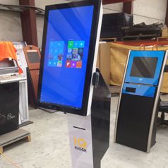 Our 27 inch portrait P21 kiosk configured with a card reader and printer for loyalty customers