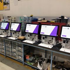 A group of desktop Slimline kiosks with their doors open for servicing, produced for Births, Deaths and Marriages Victoria