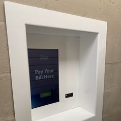 Custom outdoor bill payment kiosk produced for Ayr Backpackers
