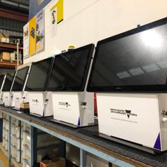 A group of desk-mounted Slimline kiosks for self-service form completion, produced for Births, Deaths and Marriages Victoria