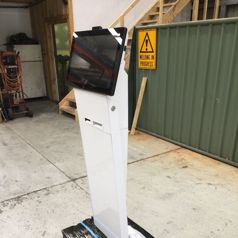 An unbranded Slimline kiosk viewed from the side